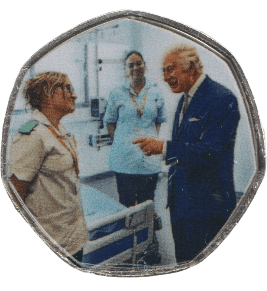 2023 50P SHAPED COIN LONG TO REIGN OVER US CHARLES III WITH NHS STAFF - 50P SHAPED COIN - Cambridgeshire Coins